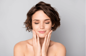 lady short bob hairstyle enjoy rejuvenation spa with soft silky facial skin eyes closed 1